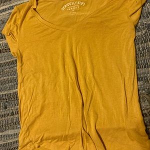 Two stretchy V neck  shirts
